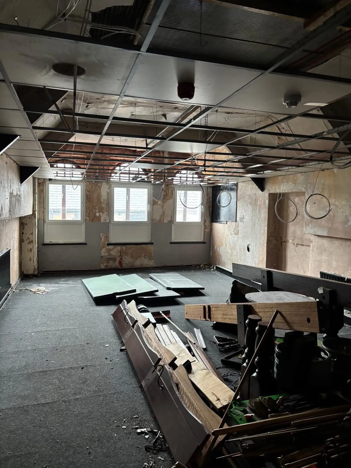 Strip-out at the Porth pool hall ahead of skim and ceiling repair